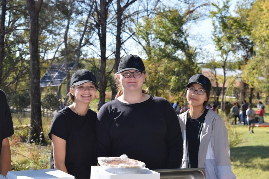 Three Blú chefs stand together at their stand. “[The fall festival] was a good way to get experience in working with others, and it also promoted Blú,” freshman Jason Parker said. “Having out stand up also reminds everyone that the school has a culinary program with students working.” Blú was one of the first groups on the long trail of clubs and organizations, and had samples of food to treat visitors, such as pie. 