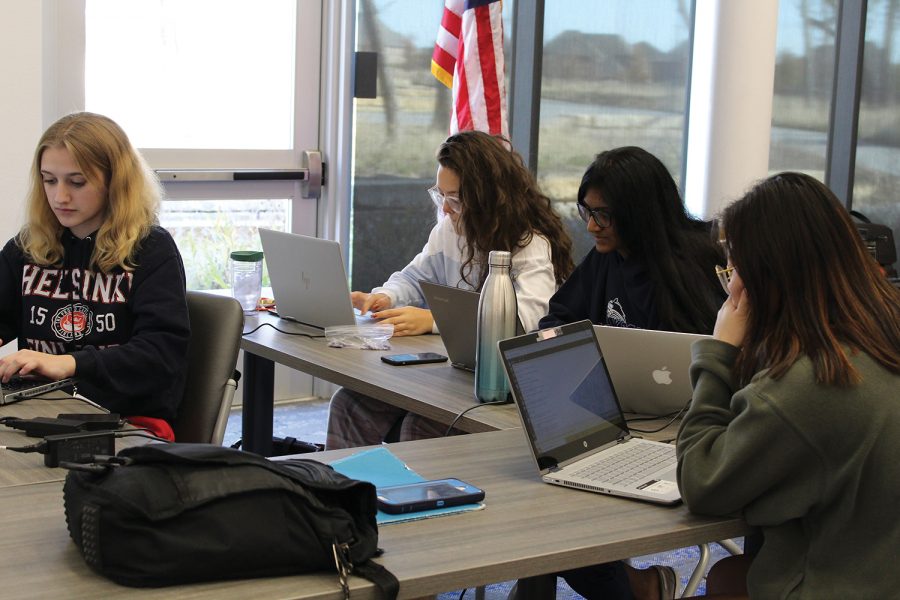 All-girls computing team Charlie competes in the U.S. cyber patriot challenge on Nov. 17. Basically, this competition is about securing the computer to prevent hackers from breaking in, junior Rebecca Huang said. Charlie is one of the two all girls teams that composes the Allen cyber patriot.