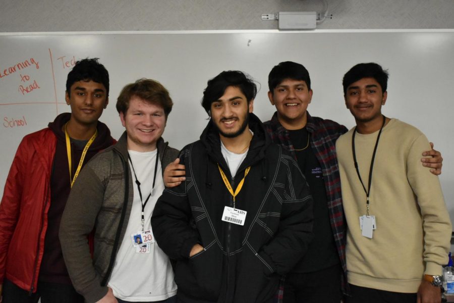 Pictured Left to Right: Treasurer Pranay Srivastava, Secretary James Wood, Vice President Vardaan Bhat, President Amrik Mohanty, and Ashvvath Vijay, Marketing Director.