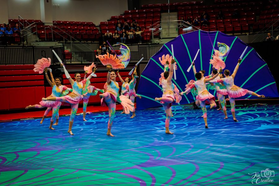 Credit: Calvin Ku / The varsity color guard performed at the Coppell NTCA Open Championship April 3. I was told when I got older with color guard I would learn to appreciate winter guard season,” Demorizi said. “I didn’t like winter guard season, I just could not get into it. Last year with COVID we had to scrap winter guard season, it did make me start to appreciate it a little bit more.” This wraps up the winter guard season with a total of nine performances.