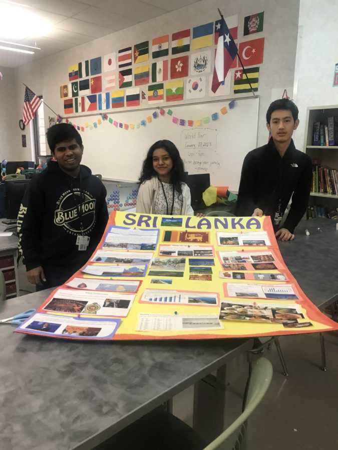 3 students who worked on a poster presentation for Sri Lanka. 