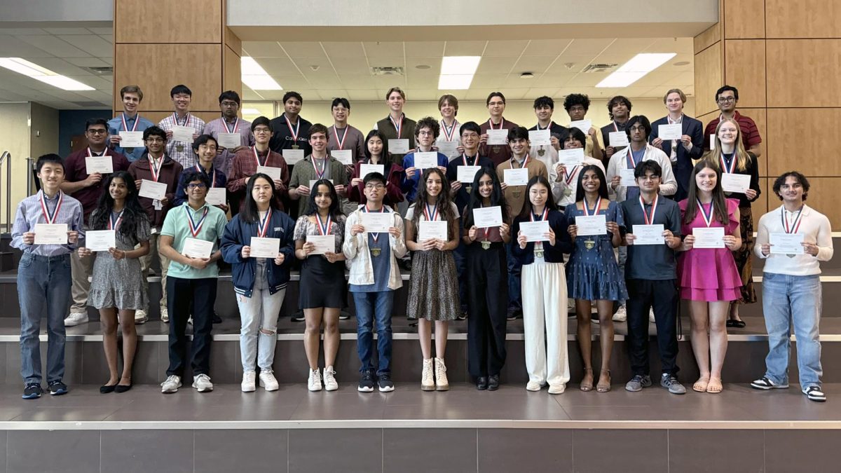 The 42 National Merit finalists with their certificates at the Allen High School Performing Arts Center, Friday, Feb. 23, 2024.