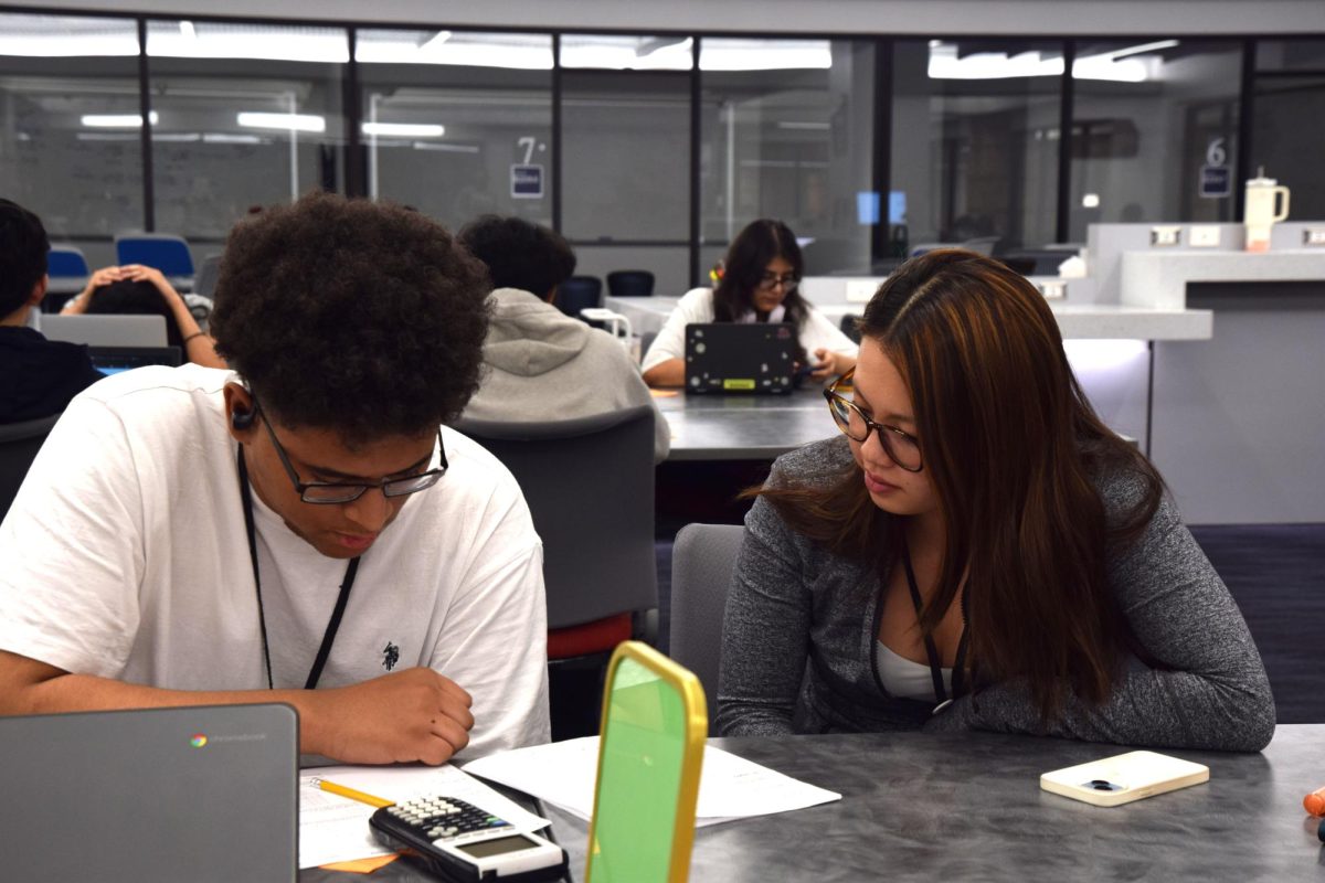 Eagle tutor Janelle Zhou tutoring a student over math Feb. 27, 2025