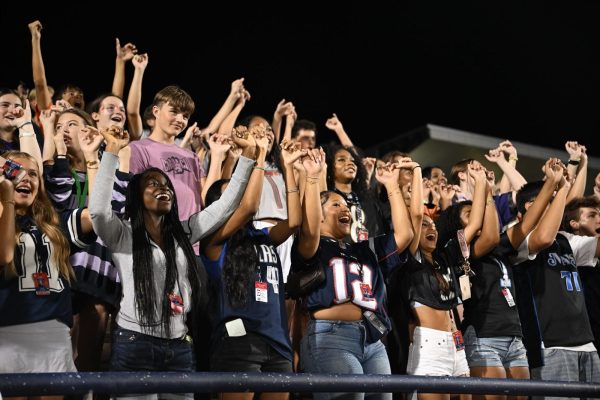 On Friday, Sept. 5, the Allen High School student section cheers during the football game on “Jersey Night.”